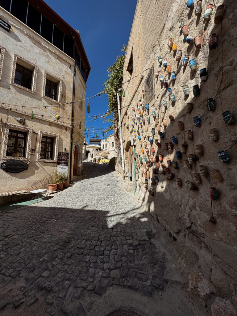 street in Cappadocia, Turkey with colorful pots.